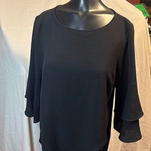 Black crepe wrap layer with layered bell sleeves